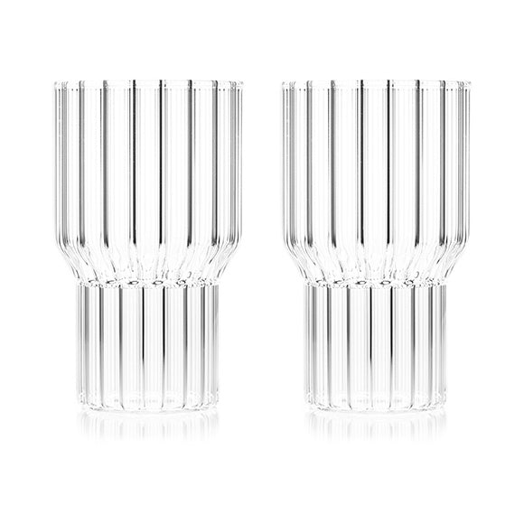 A pair of large, fluted contemporary drinking glasses by award-winning designer, Felicia Ferrone.