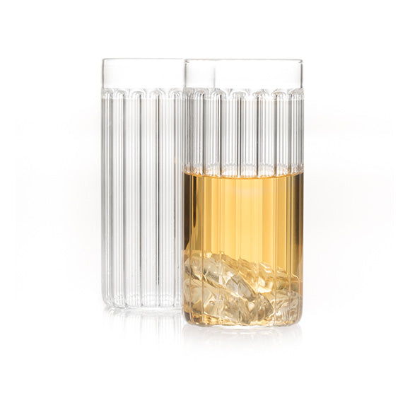 Designer tall glasses in fluted glass by Felicia Ferrone. 