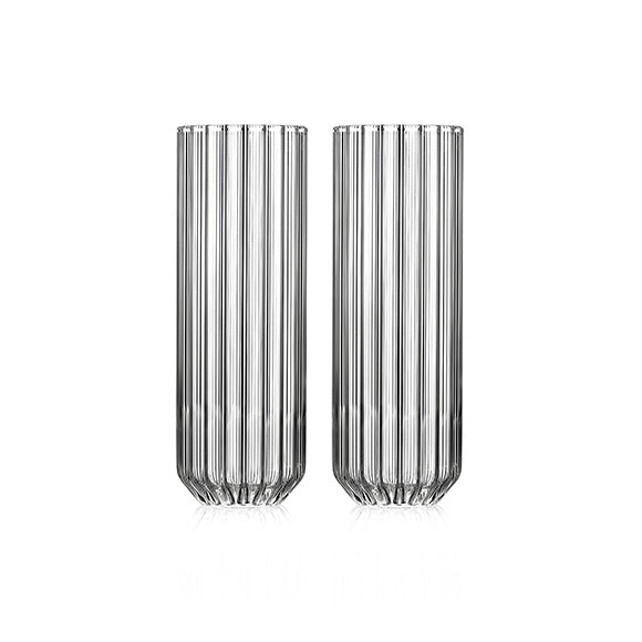 Set of two modern designer champagne glasses in fluted glass by Felicia Ferrone.