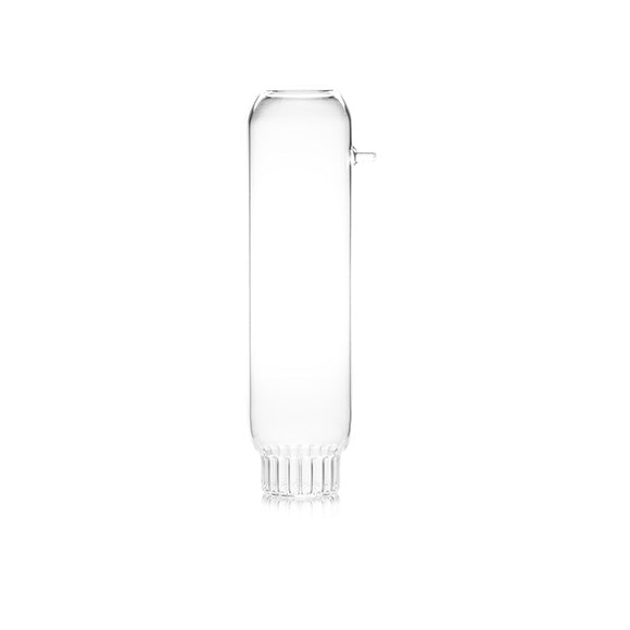 A tall, clear, designer glass water carafe or wine decanter for a contemporary kitchen.