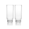 A pair of clear, contemporary champagne glasses, handmade in the Czech Republic and designed by Felicia Ferrone.