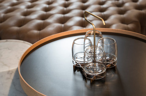 Specialty whisky glasses and brass presenter.