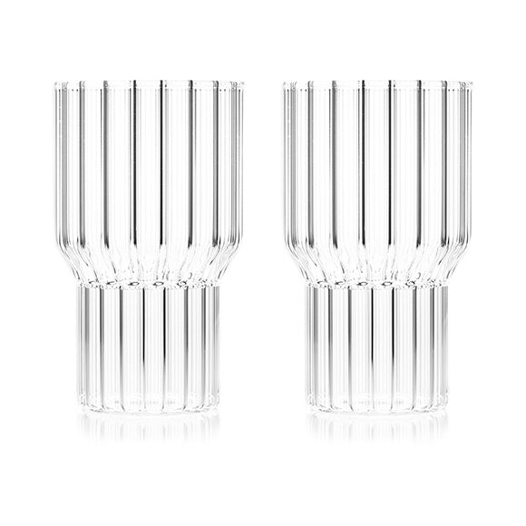 A pair of large, fluted contemporary drinking glasses by award-winning designer, Felicia Ferrone. 