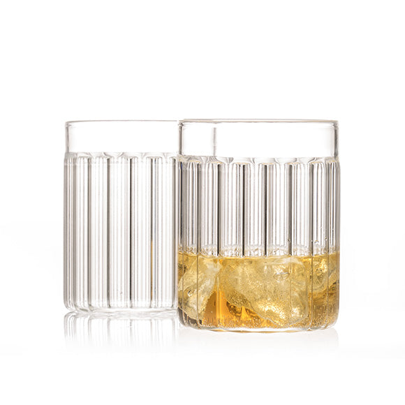Set of two designer tumbler glasses in fluted glass called "Bessho Tumbler" by Felicia Ferrone. 