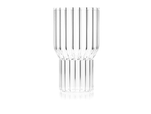 One clear, fluted, modern drinking glass by contemporary designer, Felicia Ferrone.