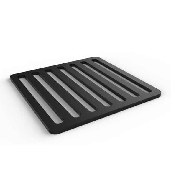 Black trivet inspired by the streets of Italy.