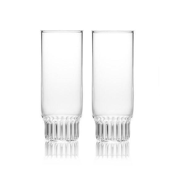 A pair of clear, contemporary champagne glasses, handmade in the Czech Republic and designed by Felicia Ferrone.