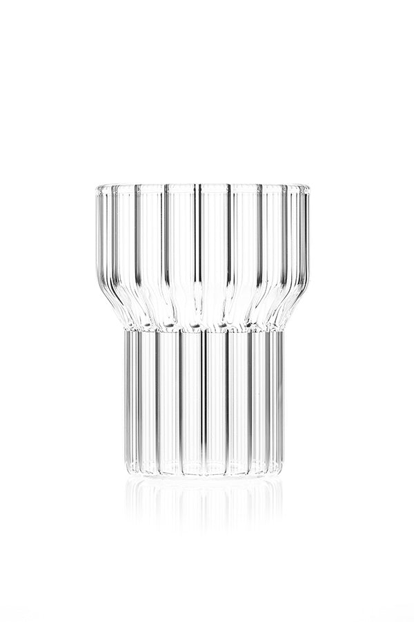 Empty, clear fluted glass by contemporary designer, Felicia Ferrone.