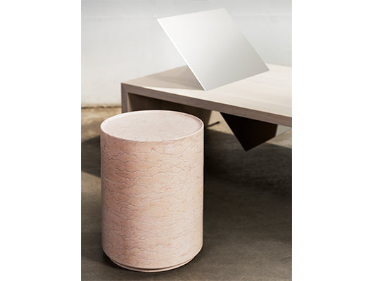 Pink marble side table with daybed. 