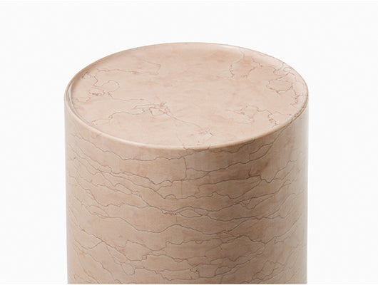 Close up of pink marble side table. 