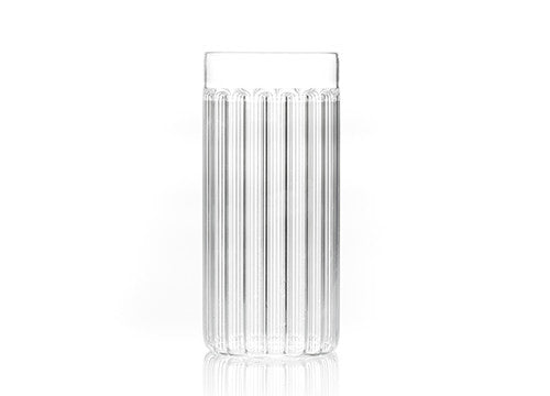 Designer tall glass in fluted glass by Felicia Ferrone. 