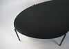 Close up of designer black metal table for contemporary living space. 